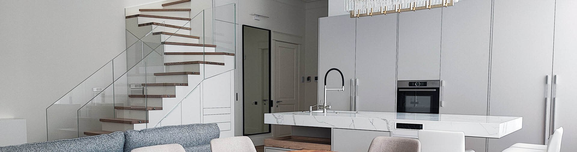 Minimalism in the Interior — open living area with floating wood-and-glass staircase and marble kitchen island, interior design by Inna Lysetska