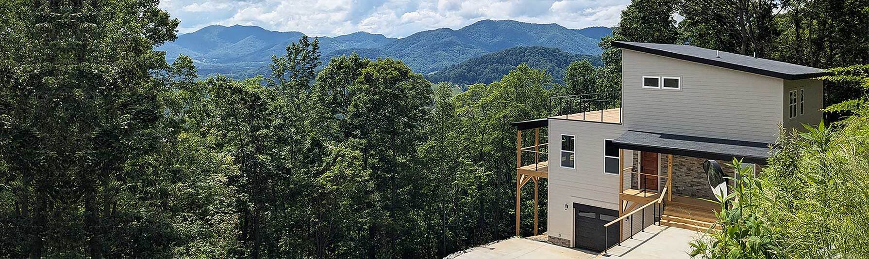 Modern Mountain Living — panoramic exterior overlooking the Blue Ridge Mountains, built by IDL Construction