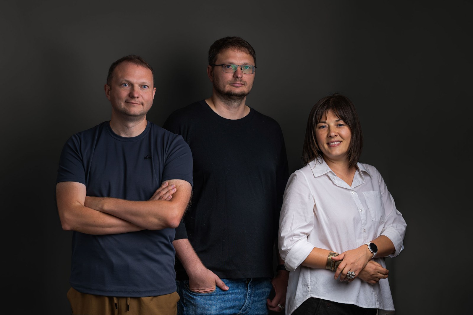 Inna Lysetska, Stanislav Lysetskyi, and Bogdan Lysetskyi — the IDL Construction team, Asheville NC
