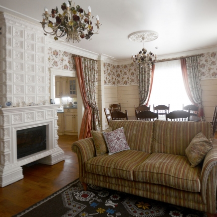 Provençal reading nook with armchair and tall window