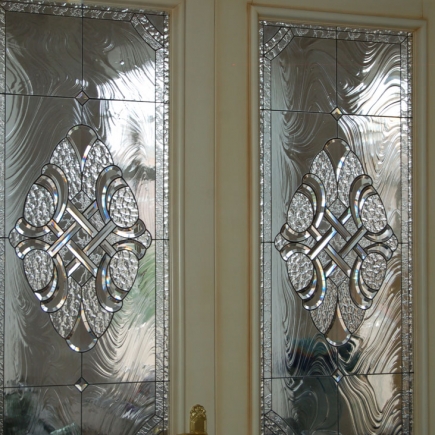 Close-up of the beveled and leaded stained-glass door panels