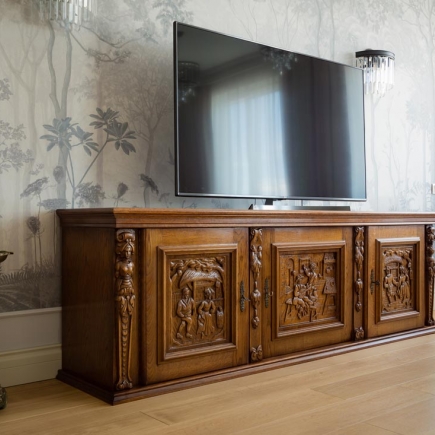 Closet with custom built-in shelving and mirrors
