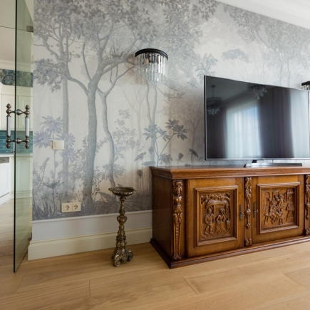 Home office with antique desk and brass lamp