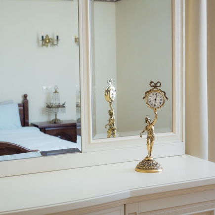 Luxurious bathroom with freestanding bathtub and gold fixtures