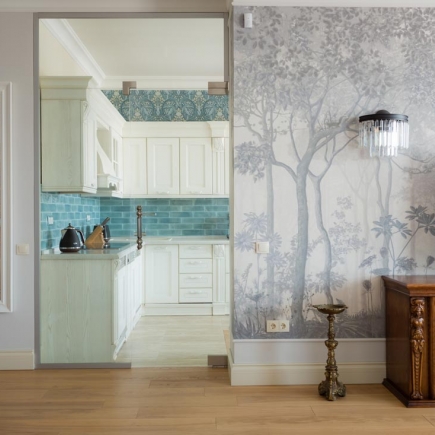 Powder room with decorative wallpaper and vessel sink