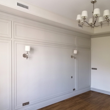 Office WC with striped wallpaper above ornate relief panels