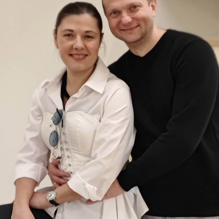 Couple posing together indoors